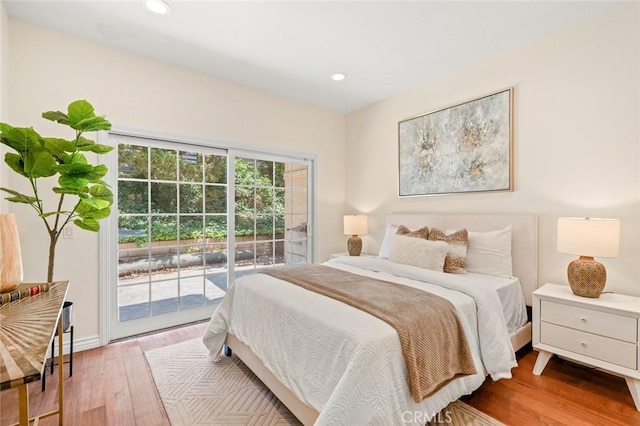 21557 Ambushers St, Diamond Bar, CA 91765 - bedroom with access to exterior, wood finished floors, and recessed lighting