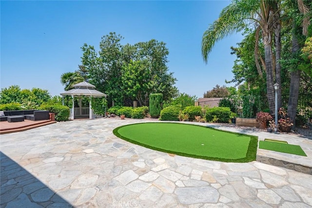 21557 Ambushers St, Diamond Bar, CA 91765 - view of patio with a putting area, a gazebo, and an outdoor hangout area