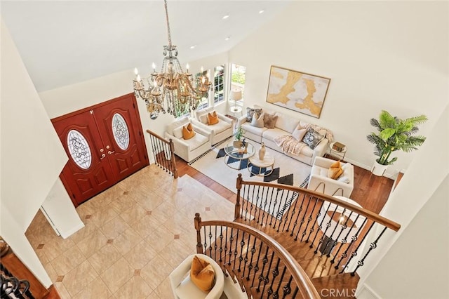 21557 Ambushers St, Diamond Bar, CA 91765 - foyer entrance featuring a chandelier, high vaulted ceiling, light wood-type flooring, stairway, and recessed lighting