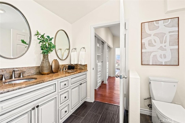 21557 Ambushers St, Diamond Bar, CA 91765 - full bath featuring double vanity, lofted ceiling, and wood finished floors