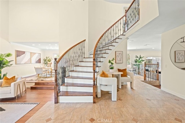 21557 Ambushers St, Diamond Bar, CA 91765 - stairs featuring a towering ceiling and tile patterned floors