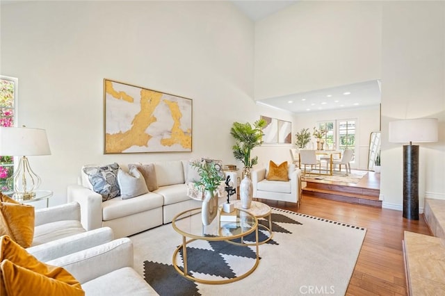 21557 Ambushers St, Diamond Bar, CA 91765 - living area with wood finished floors, a towering ceiling, and recessed lighting
