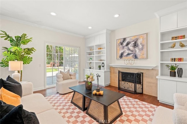 21557 Ambushers St, Diamond Bar, CA 91765 - living area with wood finished floors, a high end fireplace, crown molding, recessed lighting, and built in features