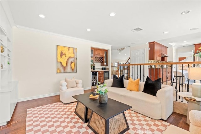 21557 Ambushers St, Diamond Bar, CA 91765 - living room with light wood finished floors, ornamental molding, recessed lighting, stairs, and beverage cooler