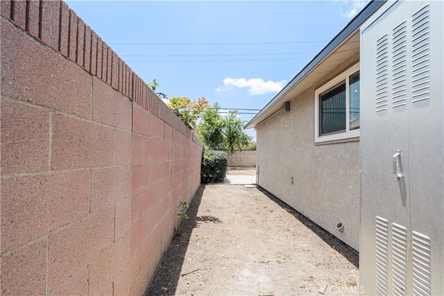 12302 Beaty Ave, Norwalk, CA 90650 - view of home's exterior with stucco siding