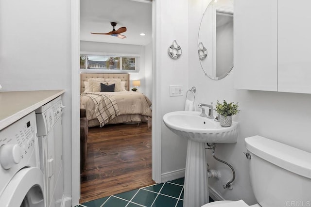 4704 Jumano Ave, San Diego, CA 92117 - ensuite bathroom with a ceiling fan, washing machine and dryer, and tile patterned floors
