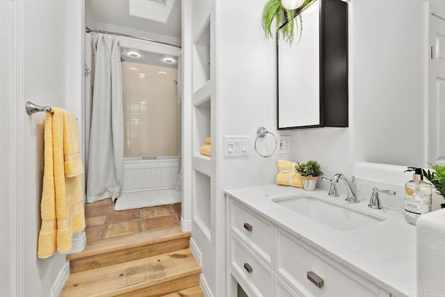 4704 Jumano Ave, San Diego, CA 92117 - full bath with vanity and shower / tub combo with curtain