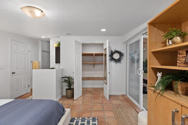 4704 Jumano Ave, San Diego, CA 92117 - bedroom with recessed lighting and a spacious closet