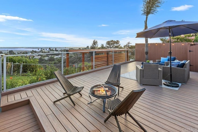 4704 Jumano Ave, San Diego, CA 92117 - deck with an outdoor living space with a fire pit