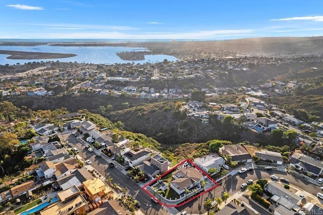 4704 Jumano Ave, San Diego, CA 92117 - aerial view of property's location featuring property parcel outlined, a nearby body of water, and nearby suburban area
