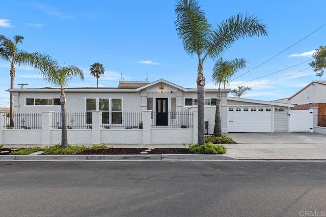 4704 Jumano Ave, San Diego, CA 92117 - single story home with a garage, a fenced front yard, concrete driveway, a gate, and stucco siding