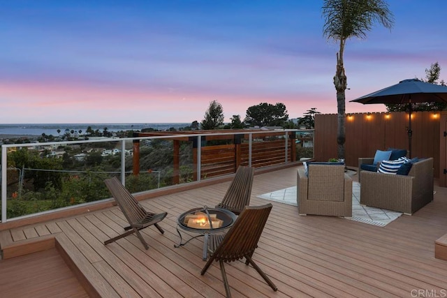 4704 Jumano Ave, San Diego, CA 92117 - wooden terrace with an outdoor living space with a fire pit