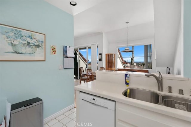 50 Los Cabos, Dana Point, CA 92629 - kitchen featuring dishwasher, light countertops, white cabinets, and decorative light fixtures