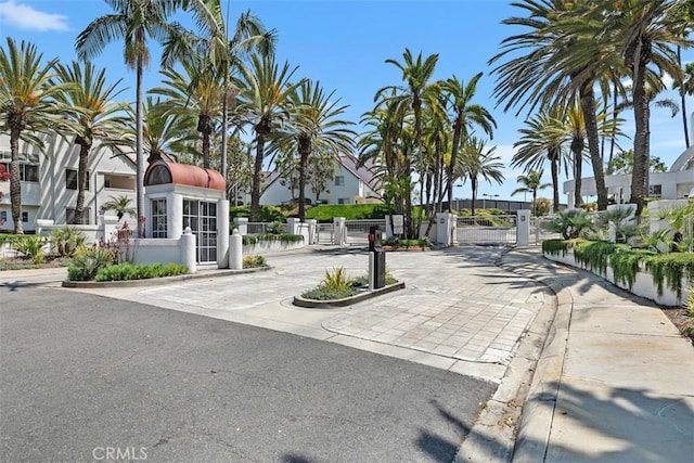 50 Los Cabos, Dana Point, CA 92629 - view of asphalt road with a gate, curbs, and a gated entry