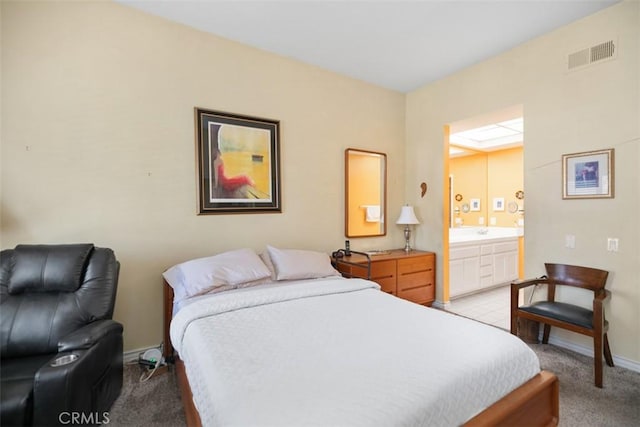 50 Los Cabos, Dana Point, CA 92629 - bedroom featuring light colored carpet and connected bathroom