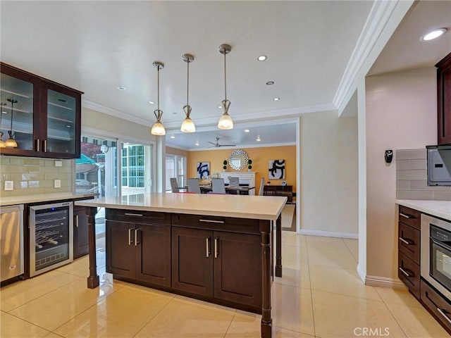 2903 Parkview Dr, Alhambra, CA 91803 - kitchen with beverage cooler, tasteful backsplash, light countertops, hanging light fixtures, and light tile patterned floors