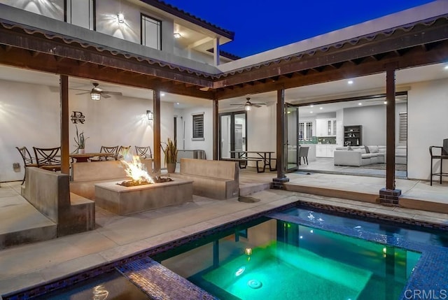 2184 Pacific Crest Dr, Alpine, CA 91901 - rear view of house featuring a ceiling fan, an outdoor living space with a fire pit, stucco siding, and a patio