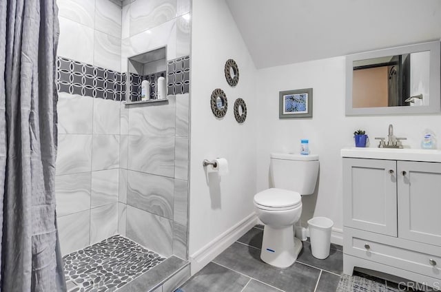 2184 Pacific Crest Dr, Alpine, CA 91901 - bathroom with vanity, a tile shower, tile patterned floors, and lofted ceiling