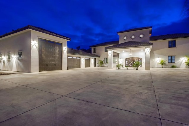 2184 Pacific Crest Dr, Alpine, CA 91901 - view of front of property featuring concrete driveway, an attached garage, stucco siding, and a tiled roof