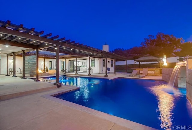 2184 Pacific Crest Dr, Alpine, CA 91901 - pool at night featuring a pergola, a patio area, and a jacuzzi