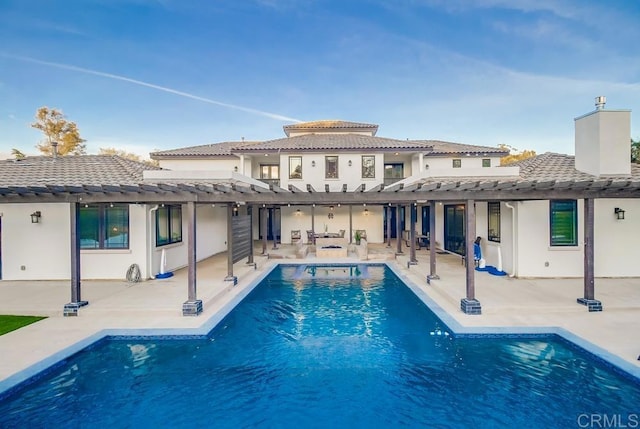 2184 Pacific Crest Dr, Alpine, CA 91901 - rear view of property featuring a pergola, a patio area, an outdoor pool, and stucco siding