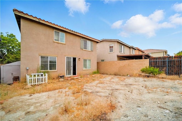 6257 Long Cove Dr, Fontana, CA 92336 - rear view of house with stucco siding