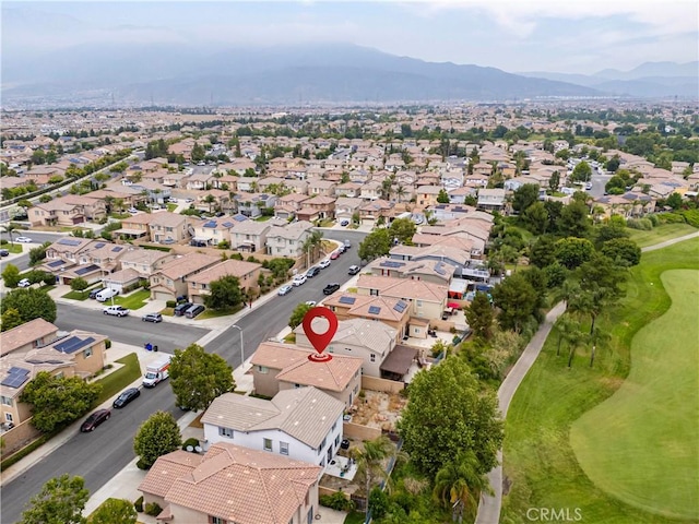 6257 Long Cove Dr, Fontana, CA 92336 - aerial view of residential area featuring a mountainous background and a golf club