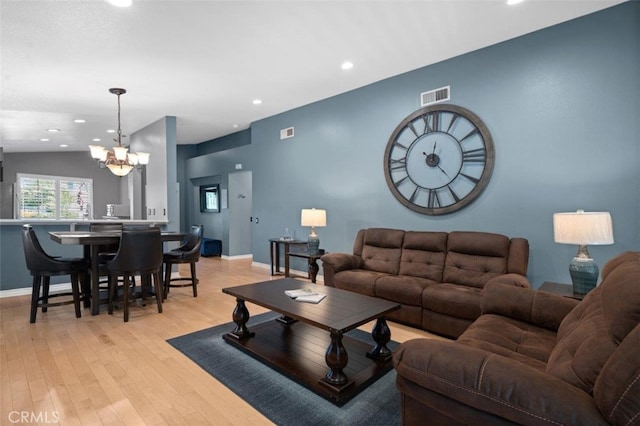 11901 Ardmoor Ct, Rancho Cucamonga, CA 91739 - living room featuring light wood-style flooring, a chandelier, and recessed lighting