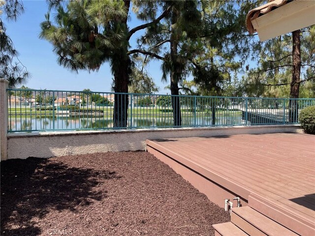 28652 Bridge Water Ln, Menifee, CA 92584 - wooden deck featuring a fenced backyard