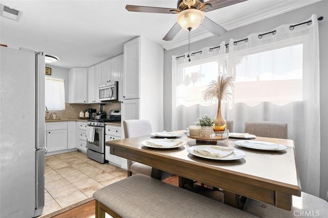 339 W Alcross St, Covina, CA 91722 - dining area with a ceiling fan and light tile patterned floors