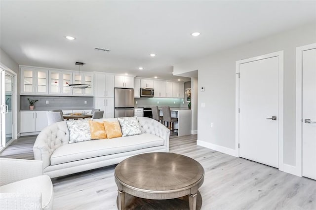 4014 Calle Sonora Oeste Unit 2B, Laguna Woods, CA 92637 - living room with light wood finished floors and recessed lighting