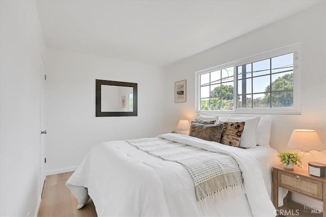 367 E Pacific Ave, Fairfield, CA 94533 - bedroom with light wood-type flooring and baseboards
