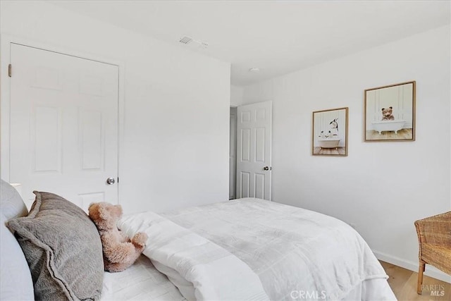 367 E Pacific Ave, Fairfield, CA 94533 - bedroom with light wood-style floors and baseboards