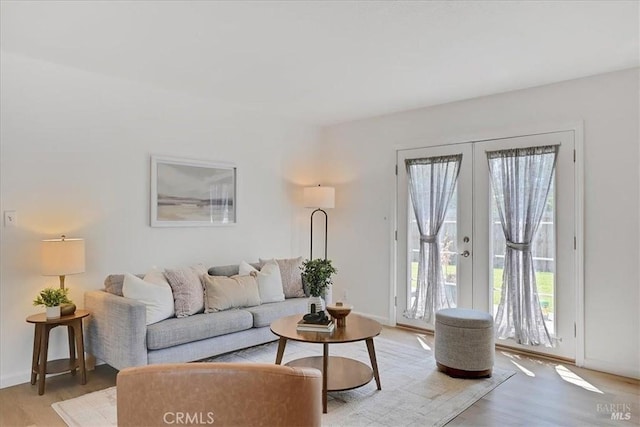 367 E Pacific Ave, Fairfield, CA 94533 - living room with light wood-style flooring and french doors