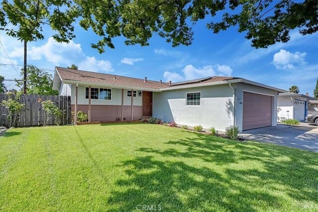 367 E Pacific Ave, Fairfield, CA 94533 - single story home with an attached garage, stucco siding, concrete driveway, and roof mounted solar panels