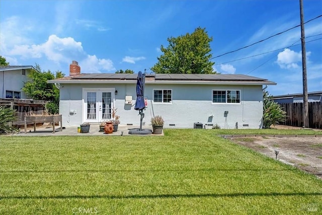 367 E Pacific Ave, Fairfield, CA 94533 - back of house featuring french doors, roof mounted solar panels, stucco siding, and a patio