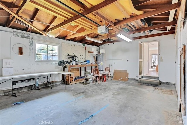 367 E Pacific Ave, Fairfield, CA 94533 - garage with a workshop area, water heater, and a garage door opener