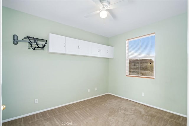 40028 Bluff Ct, Palmdale, CA 93551 - empty room with light colored carpet and ceiling fan