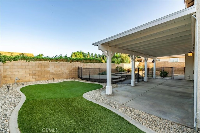 40028 Bluff Ct, Palmdale, CA 93551 - fenced backyard with a patio