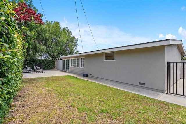 2323 Colgate Dr, Costa Mesa, CA 92626 - rear view of house with a patio and crawl space