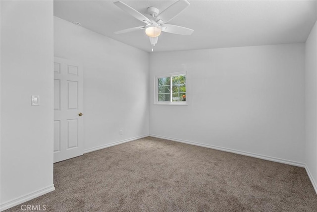 2323 Colgate Dr, Costa Mesa, CA 92626 - carpeted empty room with ceiling fan and baseboards