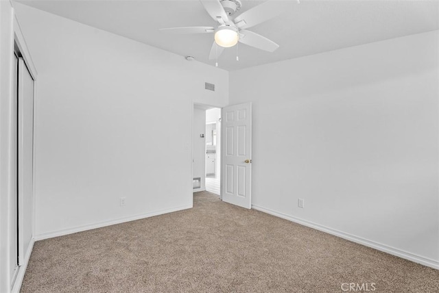 2323 Colgate Dr, Costa Mesa, CA 92626 - unfurnished bedroom with carpet flooring, a closet, and a ceiling fan