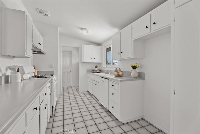 2323 Colgate Dr, Costa Mesa, CA 92626 - kitchen featuring white appliances, lofted ceiling, under cabinet range hood, light countertops, and white cabinets