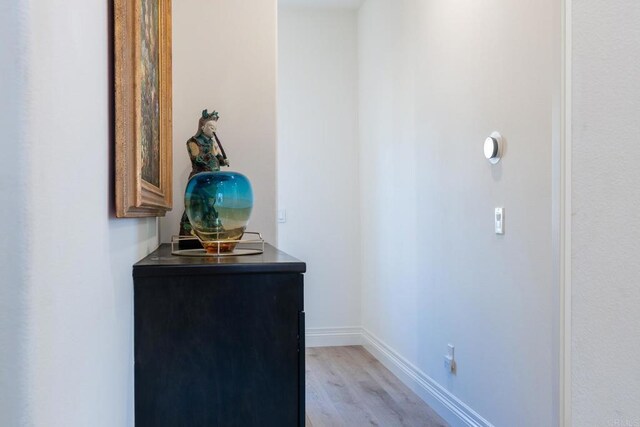 4336 Harbor Way Unit 1, Oceanside, CA 92056 - hallway with light wood-style flooring and baseboards