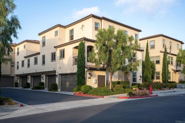 4336 Harbor Way Unit 1, Oceanside, CA 92056 - view of building exterior featuring a garage