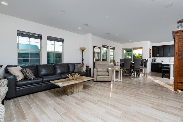 4336 Harbor Way Unit 1, Oceanside, CA 92056 - living area with light wood-style flooring and recessed lighting