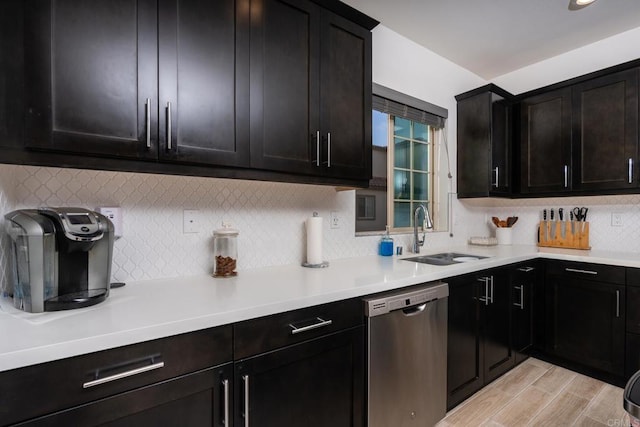 4336 Harbor Way Unit 1, Oceanside, CA 92056 - kitchen with dishwasher, light countertops, decorative backsplash, and light wood finished floors