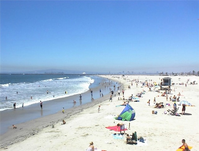 240 Nice Ln Unit 114, Newport Beach, CA 92663 - water view featuring nearby beach