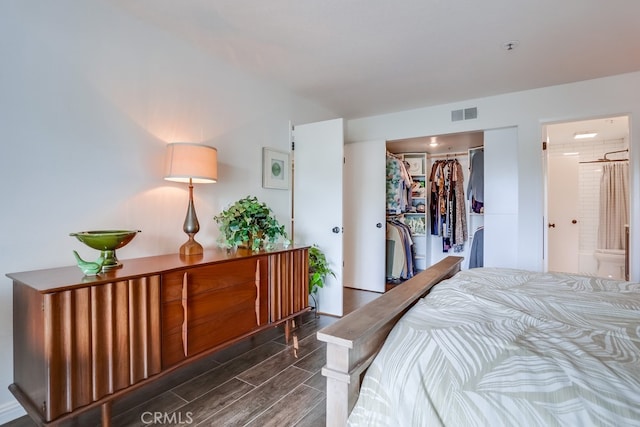 240 Nice Ln Unit 114, Newport Beach, CA 92663 - bedroom featuring wood finish floors, a closet, a walk in closet, and ensuite bath