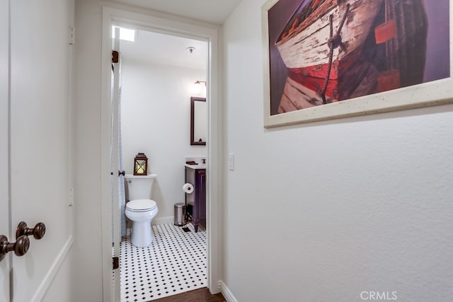 240 Nice Ln Unit 114, Newport Beach, CA 92663 - bathroom featuring toilet and tile patterned floors
